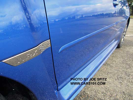 2017 Subaru WRX and STI optional body side moldings. Shown on a Rally Blue WRX