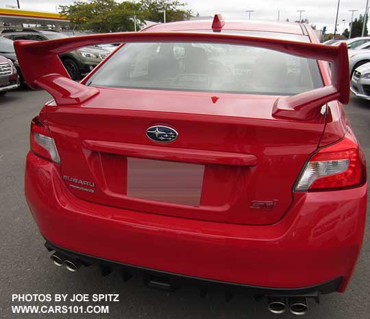 closeup of the 2017 Subaru STI tall wing spoiler, pure red shown. Standard on STI, optional on STI Limited