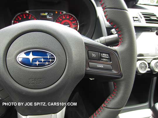 2017 Subaru WRX leather wrapped steering wheel has smooth leather hand grips, with red stitching