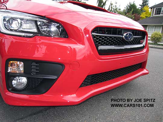 2017 Subaru WRX STI  front view with grill, fog lights, headlight.   Pure Red shown