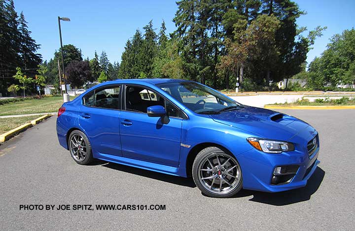 WR Blue 2017 WRX STI Limited with 18" silver BBS alloys, small rear trunk lip spoiler