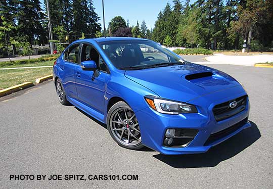 WR Blue 2017 WRX STI Limited with silver 18" BBS alloys, small rear trunk lip spoiler