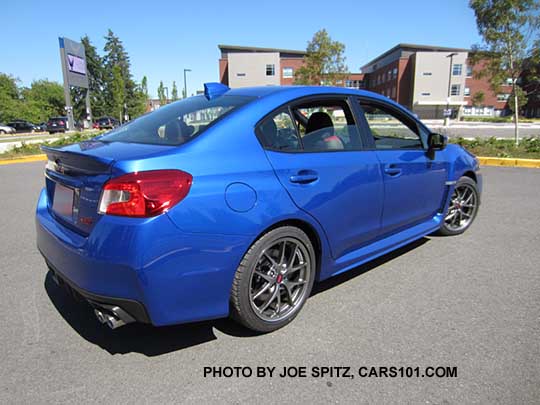 rear view WR Blue 2017 WRX STI Limited with silver 18" BBS alloys, small rear trunk lip spoiler