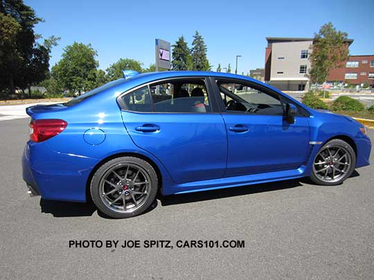 side view Work Rally WR Blue 2017 WRX STI Limited with silver 18" BBS alloys, small rear trunk lip spoiler