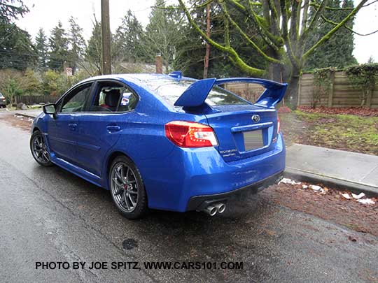rear view 2017 Subaru WRX STI Limited, tall wing spoiler, world rally blue color