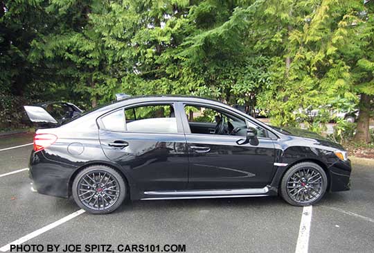 side view crystal black 2017 Subaru WRX STI with tall wing spoiler