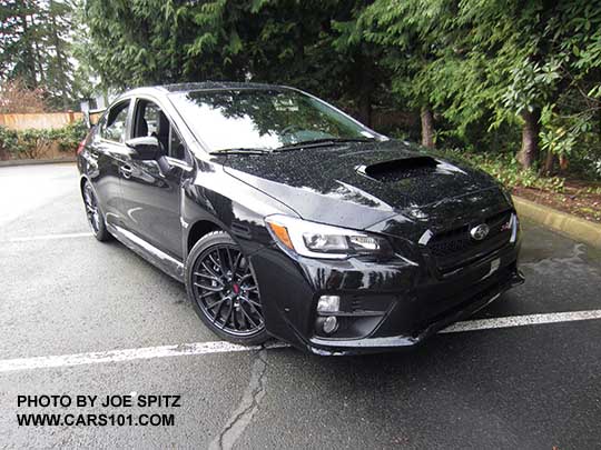 crystal black 2017 Subaru WRX STI with tall wing spoiler