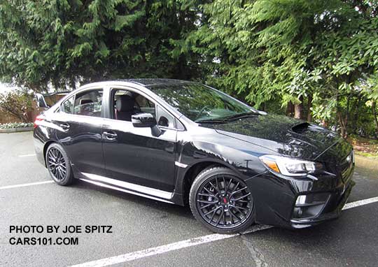 crystal black 2017 Subaru WRX STI with tall wing spoiler