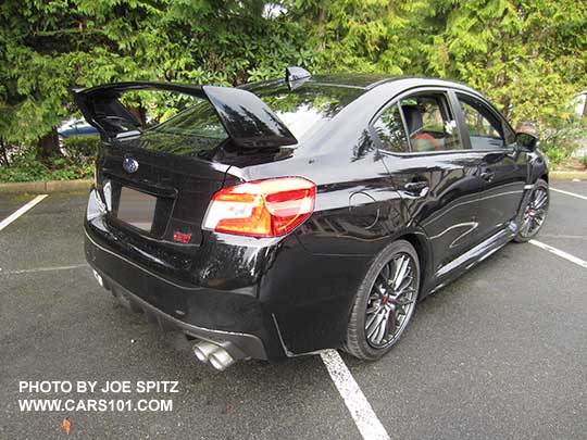 crystal black 2017 Subaru WRX STI with tall wing spoiler