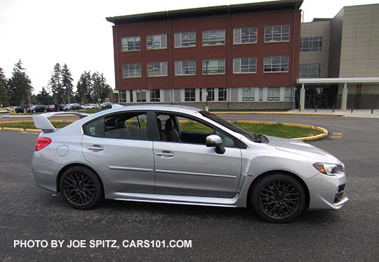 2017 Subaru WRX STI with tall wing rear spoiler and optional side moldings, ice silver color