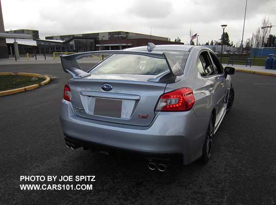 rear view 2017 Subaru WRX STI with tall wing rear spoiler, ice silver color