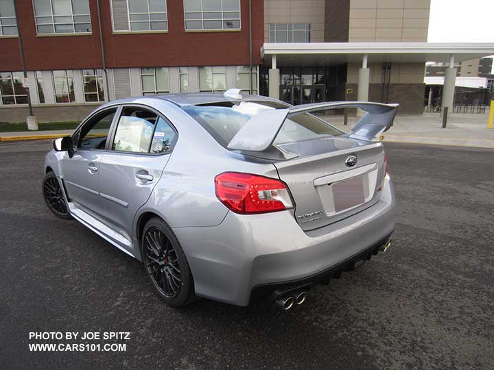 rear view  ice silver 2017 Subaru WRX STI with tall wing spoiler, with optional body side moldings
