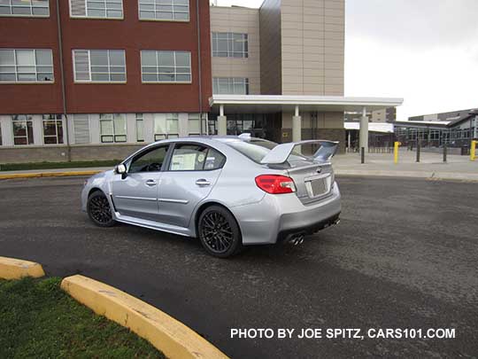 ice silver 2017 Subaru WRX STI with tall wing spoiler and optional body side moldings