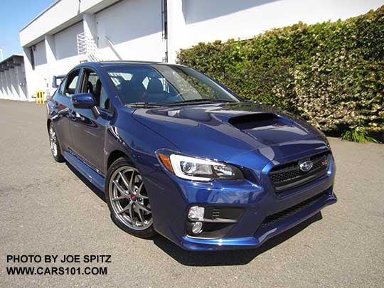 front vieww 2017 Subaru WRX STI Limited with tall wing spoiler, BBS alloys. Lapis blue color