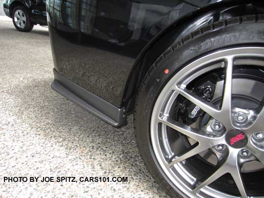 2017 WRX and STI optional dealer installed rear corner underspoiler.  Black STI Limited shown with silver BBS alloys