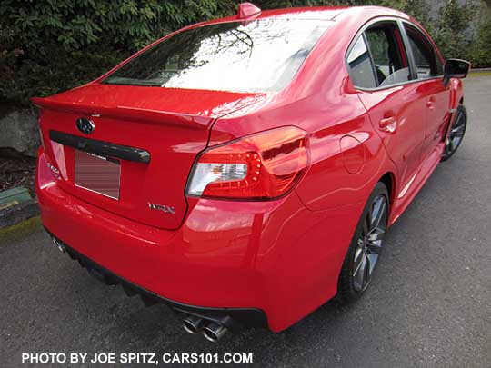 2017 Subaru WRX. Premium model, pure red color shown with optional rear trunk trim