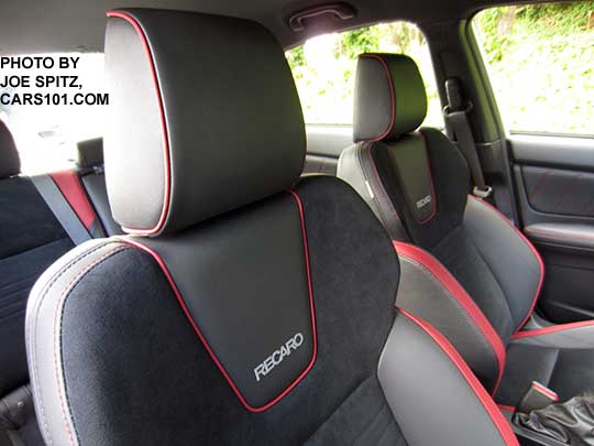 closeup of the 2018 Subaru WRX Premium optional Performance Package #12 Recaro front seat with embroidered upper logo. Black alcantara seating surface with red bolsters, red stitching and piping.