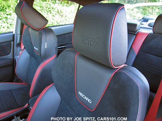 2018 Subaru WRX STI Limited Recaro seating with upper seat back logo, embossed STI on headrest. Black alcantara, red leather bolsters