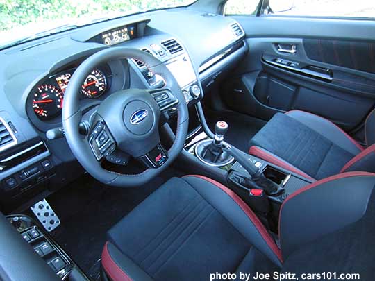 2018 Subaru STI  front seats, steering wheel, gloss black dash trim,  console, shift knob, cupholder with cover