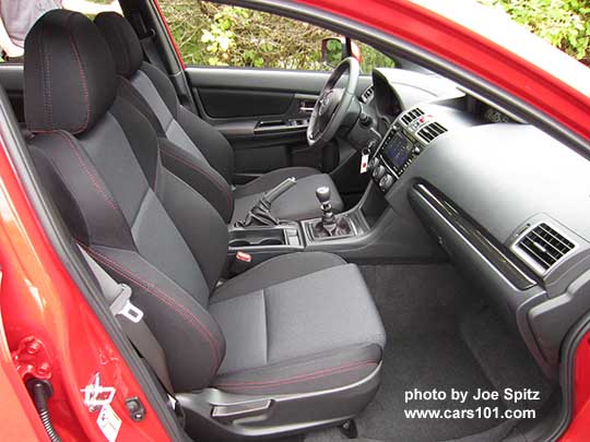 2018 Subaru WRX Premium dashboard and center console, black cloth interior from passenger side