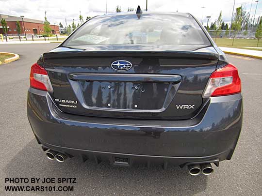2018 Subaru WRX Limited rear view with trunk lip spoiler, dark gray car shown