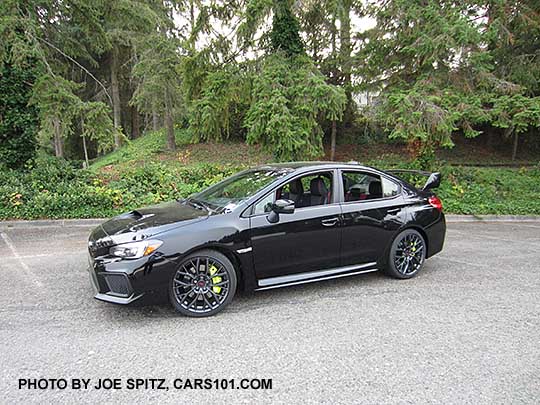 2018 Subaru WRX STI Limited with tall wing spoiler, crystal black silica shown