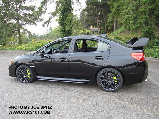 2018 Subaru WRX STI Limited with tall wing spoiler, crystal black silica shown