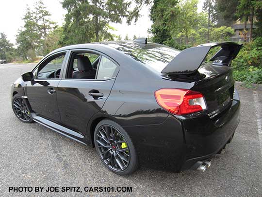 2018 Subaru WRX STI Limited with tall wing spoiler, crystal black silica shown