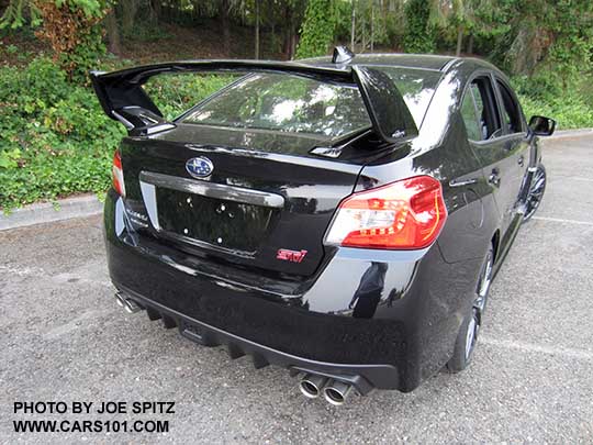 2018 Subaru WRX STI Limited with tall wing spoiler, crystal black silica shown