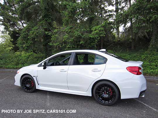 2018 Subaru WRX Premium with optional Performance Package, plus WRX Sport Package with black STI 18" alloy wheels, short shifter, STI exhaust.  Crystal white color