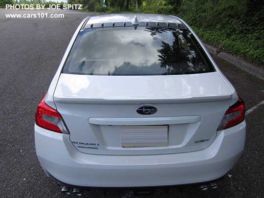 rear view 2018 Subaru WRX with optional vortex generator on the roof. Crystal white color shown.