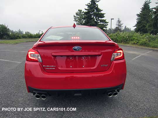 2018 Subaru WRX Premium rear view, Pure Red color shown