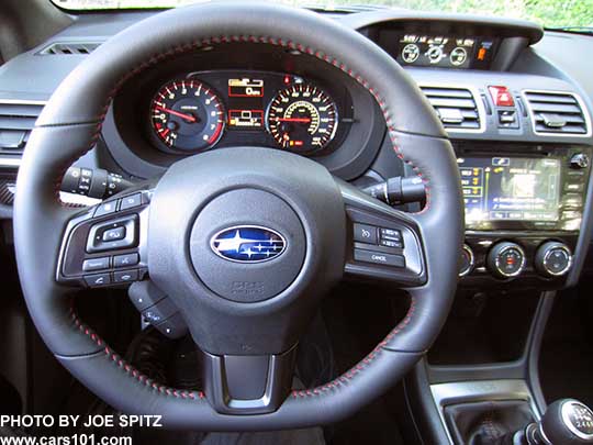 2018 Subaru WRX Limited steering wheel. D shaped, smooth leather wrapped with red stitching, fingertip audio, bluetooth, cruise controls, tilt and telescoping.