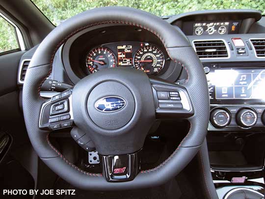 2018 Subaru WRX STI  leather wrapped steering wheel, with red stitching, pebbled grips, STI logo on center spoke