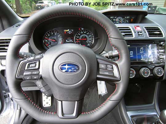 2018 Subaru WRX Limited steering wheel. D shaped, smooth leather wrapped with red stitching, fingertip audio, bluetooth, cruise controls, tilt and telescoping.