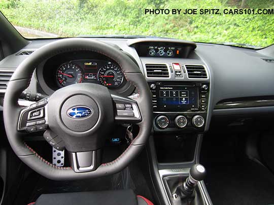 2018 Subaru WRX Premium smooth leather wrapped, red stitching, steering wheel, with optional Performance Package #12, and optional WRX Sport Package showing the STI shift knob