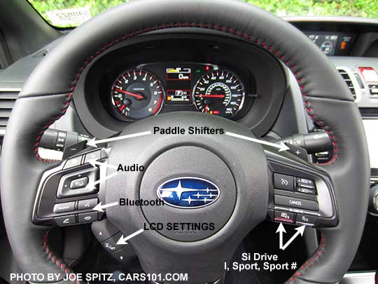 diagrammed steering wheel 2018 Subaru WRX Limited with CVT transmission, paddle shifters, center LCD screen controls,  and Si controls