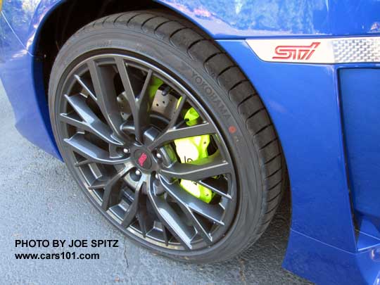 2018 Subaru WRX STI and STI Limited 19" alloy wheel, yellow brake caliper,  WR Blue car.