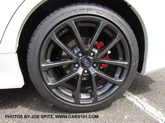 2018 Subaru WRX Premium's alloy wheel with red painted brake caliper, part of the optional Performance Package