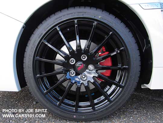 2018 Subaru WRX optional Sport Package black STI alloy wheel. Premium and Limited 18" wheel shown. Dealer installed only.  This is Premium with the optional Performance Pkg with red brake calipers.