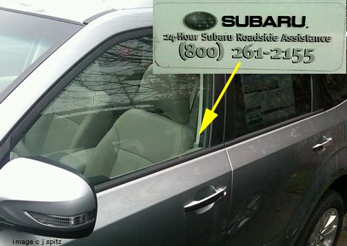 subaru roadside assistance phone number on drivers window