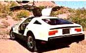 white Bricklin with open gull-wing doors
