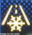 Subaru instrument panel dashboard freeze alert snowflake/road symbol turns on at 37* to warn of possible slick roads, in the center LCD