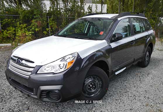 2013 subaru outback arrives covered with shipping plastic